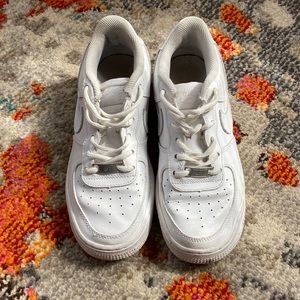 Beat up white Air Force ones